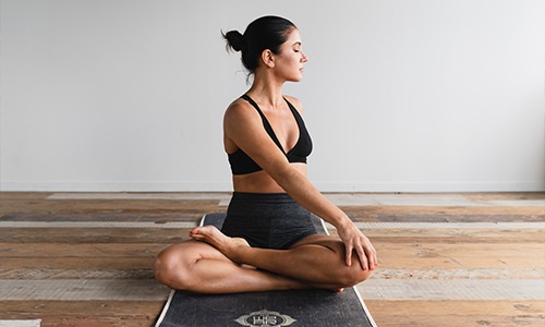 woman doing yoga