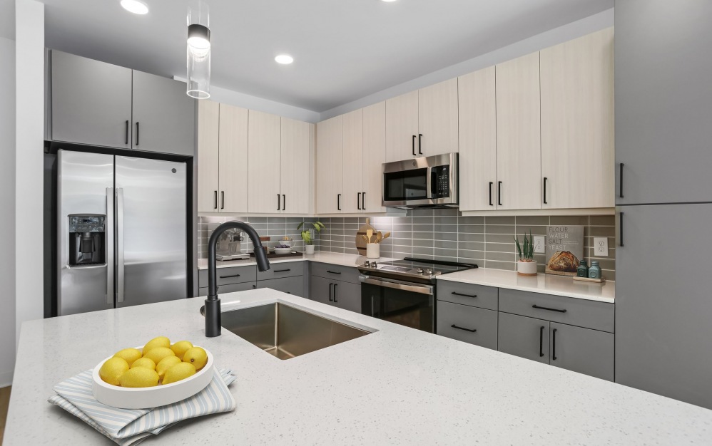 A3 - 1 bedroom floorplan layout with 1 bath and 724 square feet. (Kitchen)
